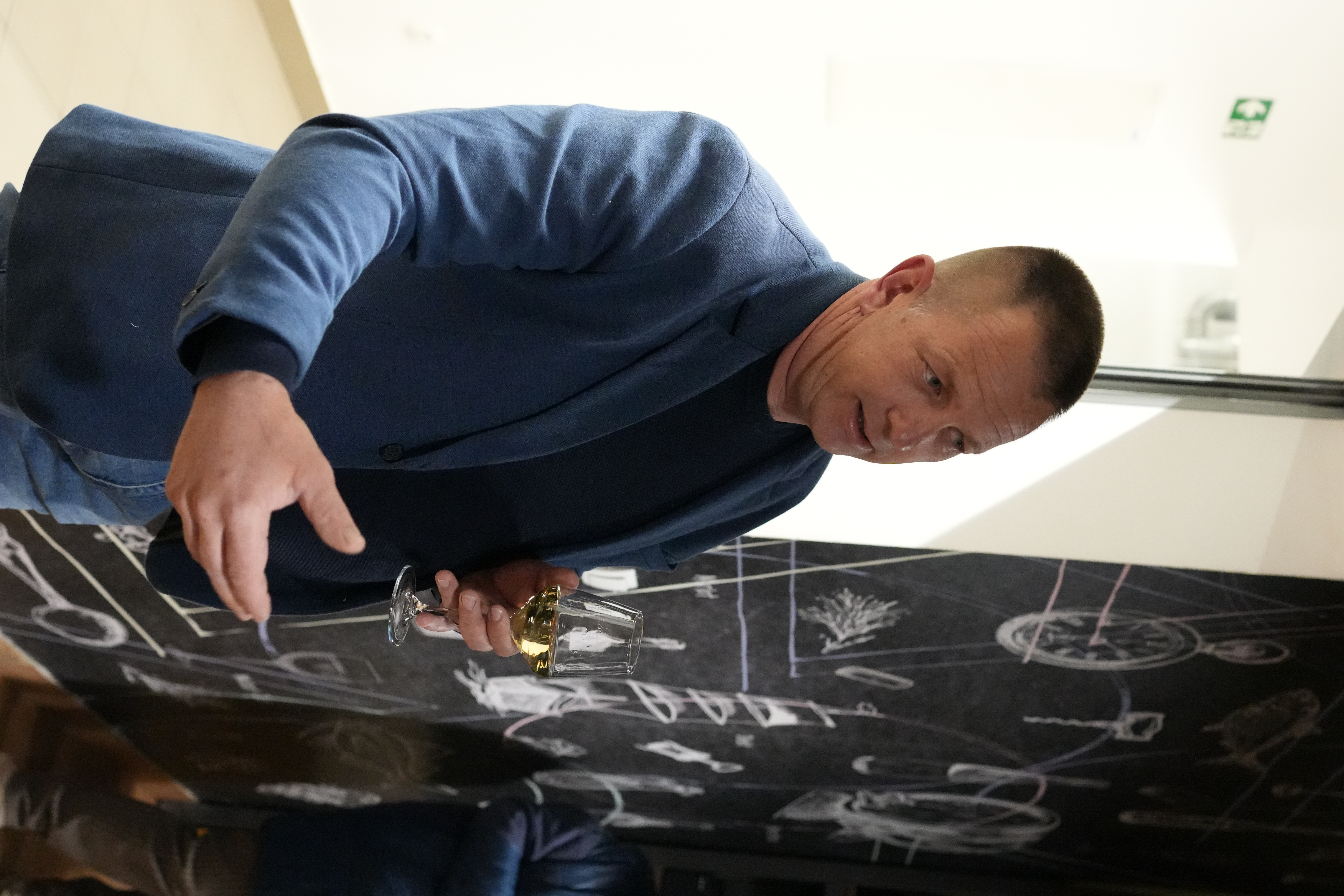 A Croatian winemaker presenting his wine